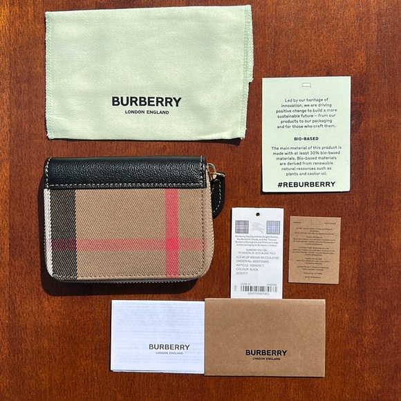 Burberry Handbags - New Burberry zip around wallet with dust bag - Black